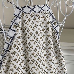 Soft, white, neutral patterned camisole.